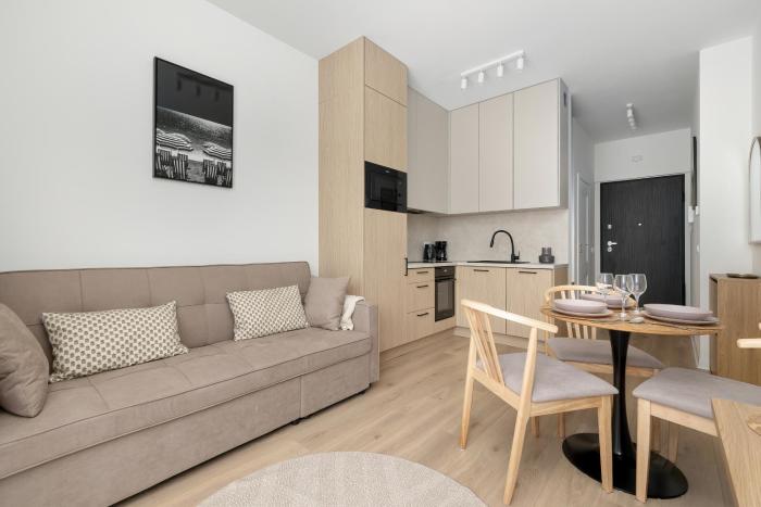 Beige Apartments By the River in Szczecin with Balconies by Noclegi Renters
