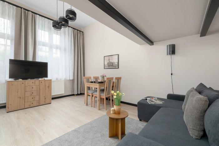 Functional Air-Conditioned Studio with a Mezzanine by Noclegi Renters