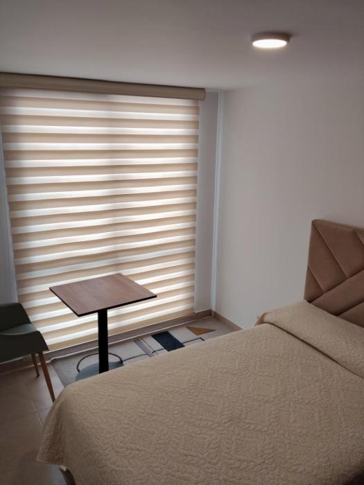 Habitación amoblada en condominio residencial