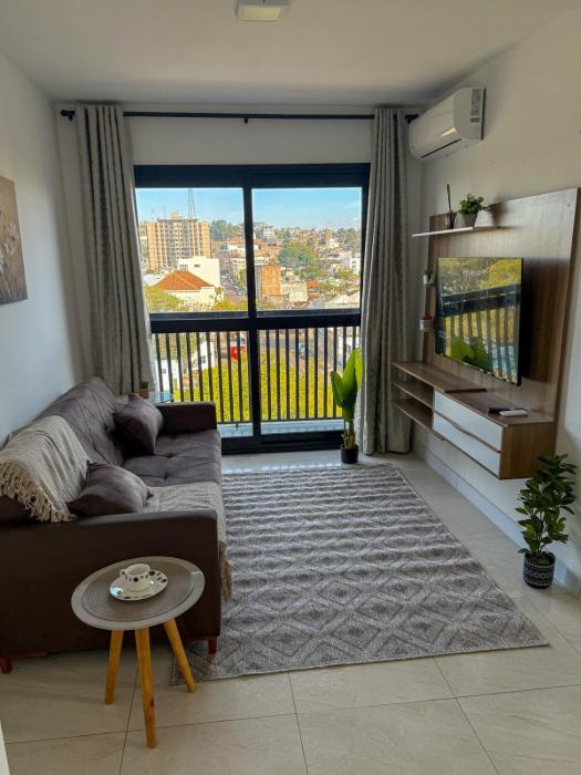 Charmoso apartamento disponível no ai r bn b com garagem a 5 min dos Freeshops