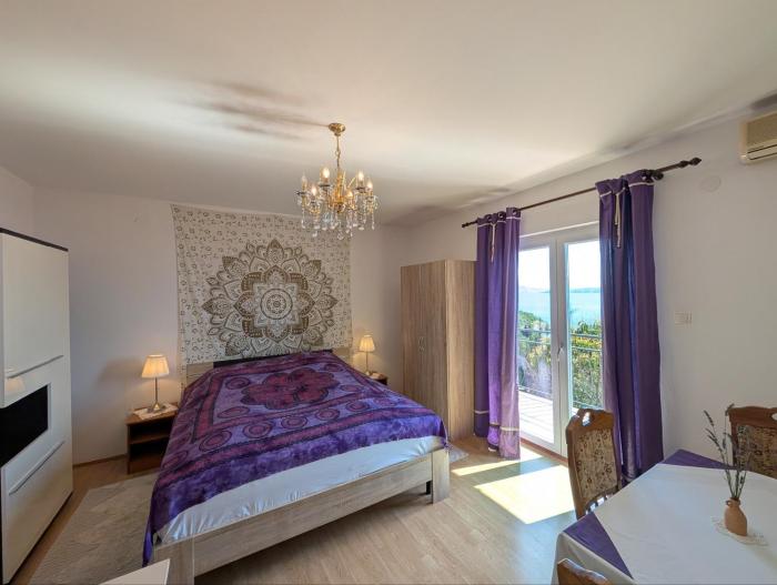 Lila Ferienwohnung mit Meerblick am Meer ca 180 Meter Luftlinie vom Strand