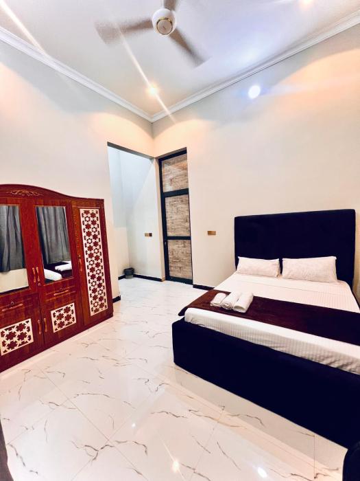 Cozy home by joyce,Room 1, 2mins walk to the Zanzibar airport
