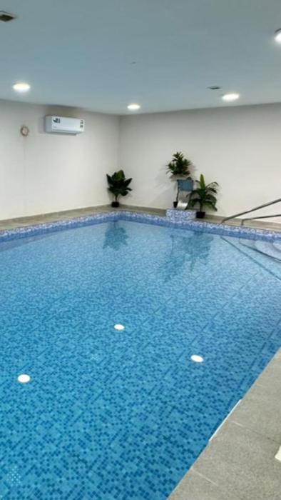 Al Hawli pool gathering