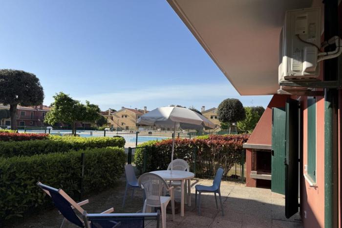 Cozy apartment with private garden in Bibione