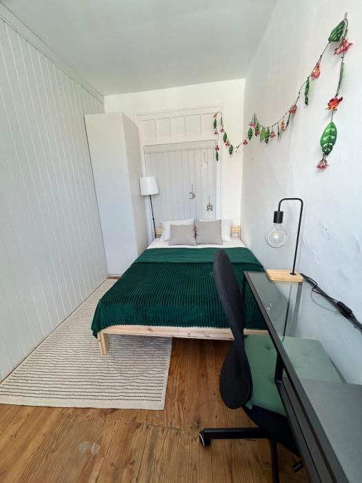 Cozy room with a view of the 25 de Abril Bridge