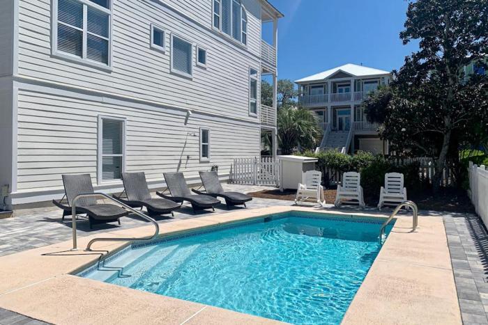 Three-story beach home with private pool beach access & bikes - golf nearby