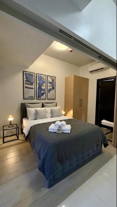 Modern Central 1BR Apt - Prime City of BGC, Manila