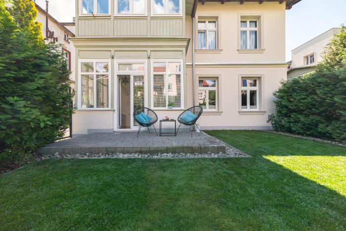 Sanhaus Apartments - MOLO 2 - apartament z ogrodem i parkingiem 3 min od plaży