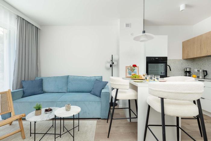 Sunny Apartment with a Balcony & Parking Near the Beach in Międzywodzie by Noclegi Renters