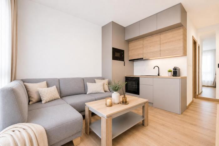 ALURE RESIDENCES 5 & 24h self check-in, private parking in front of the apartment building included, new building, the apartment building has its own park with a lake and outdoor fitness, childrens playground, CITY CENTER