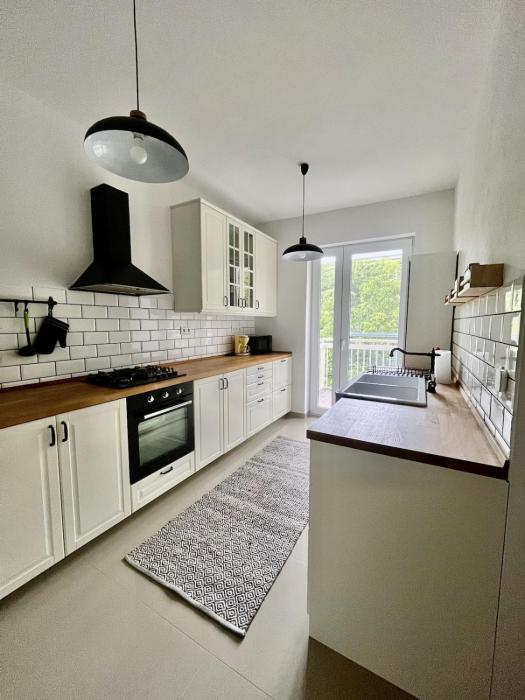 Útulný 2-izbový apartmán s balkónom v centre mesta