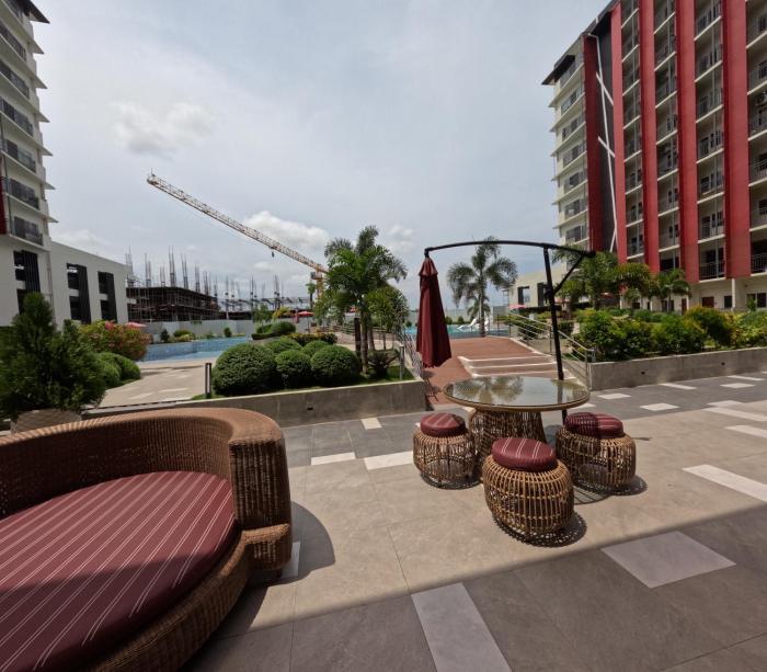 Cozy 1BR Prime World District, Near Airport, Gaisano Grand Mall, Mactan Doctors Hospital