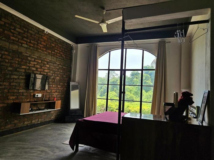 Industrial Studio with Forest Views