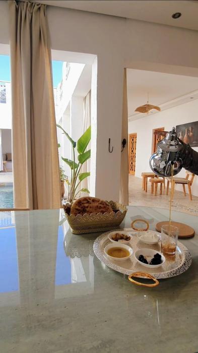 Riad SY&NI