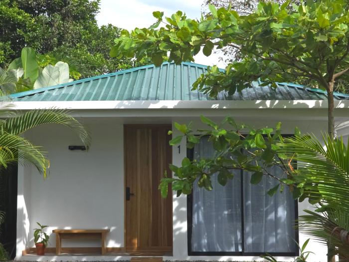 Villa del pájaro pecho amarillo