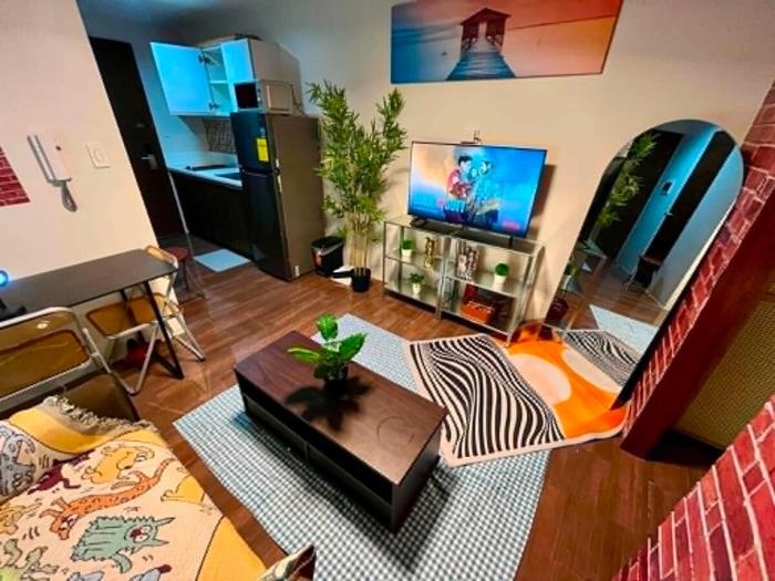 Terra Unit Vintage Brick Studio Makati Stay