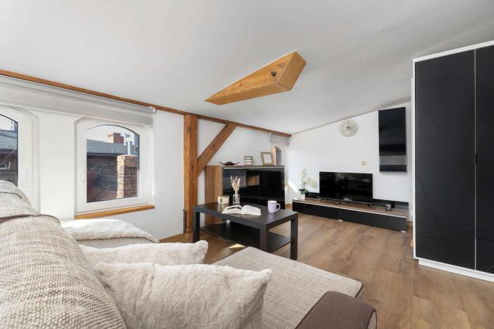 A Stylish Studio for Two in Historic Nikiszowiec by Noclegi Renters