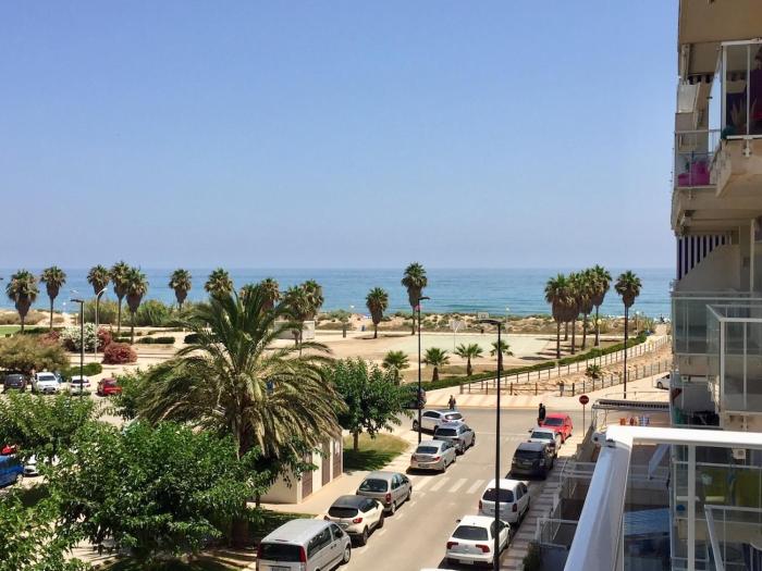 Beachfront apartment with a swimming pool and parking