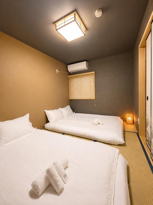 Spacious 40 Square Meter Suite with Separate Living Room and Bedroom Japanese Modern Style JR and Osaka Metro Access Near Kyocera Dome USJ