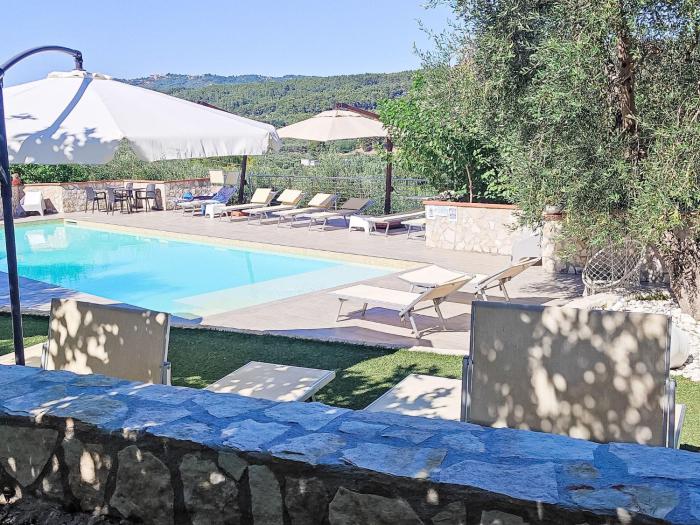 Apartment Quadrilocale in villa con piscina by Interhome