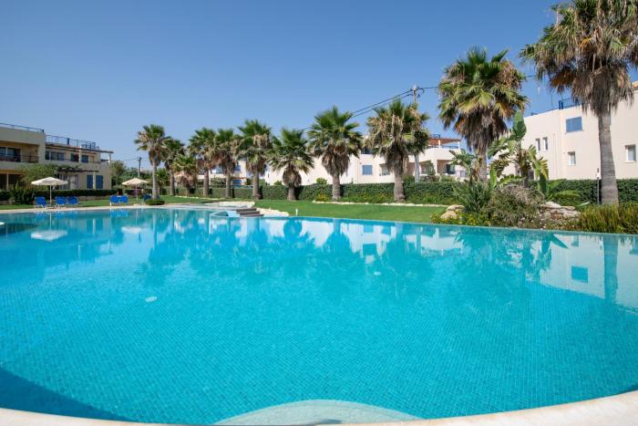 Aphrodite Beachfront Resort F202 - Shared Pool
