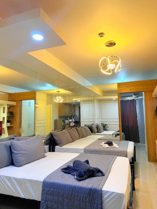 Shell Residences Combined rooms By Mae