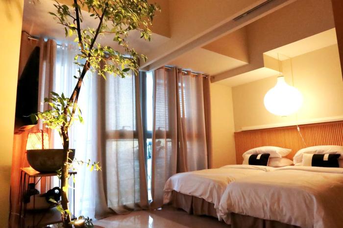Muji 1BR in Uptown Parksuites BGC