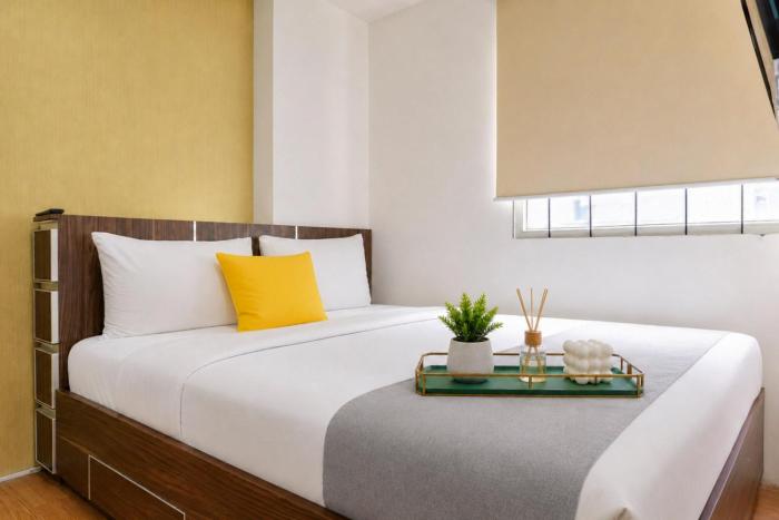 Combined and Spacious 3BR at Green Pramuka City Apartment By Travelio