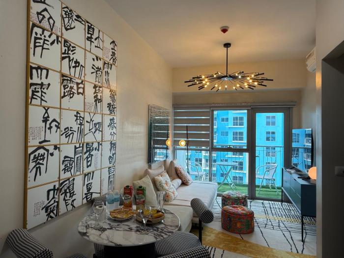 Spacious 1BR Apt with Seaview & Pool View near Okada, MOA & Airport