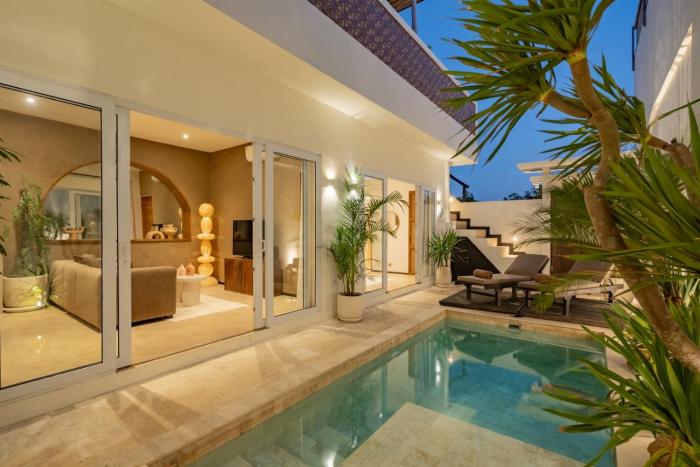 Sea-view rooftop & pool · 5min to ocean · 2 BR