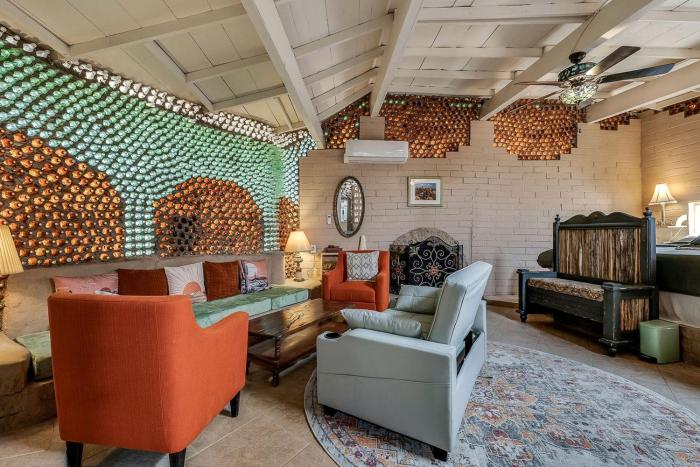 Artistic Earth House with Vibrant Glass Bottle Architecture Near Saguaro National Park in Tucson, Arizona