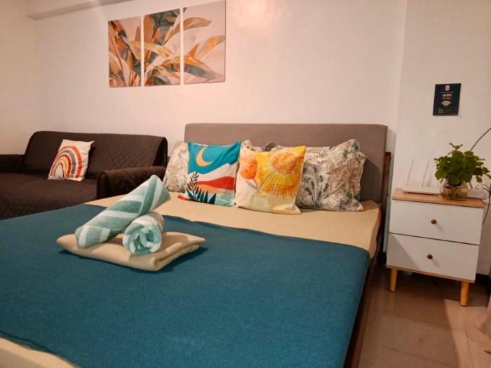 Affordable Family Studio Condo near Mactan Airport by A&C