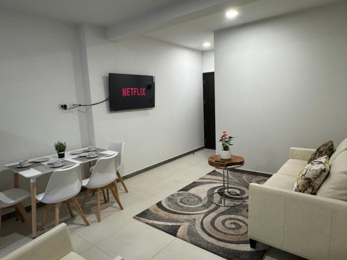 Garzonier moderno con Sofá cama premium, WiFi 150Mb y Lavadora