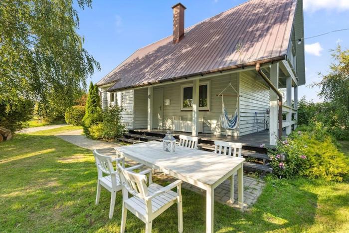 Comfortable holiday home with a fireplace