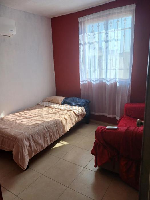 1 bedroom with shared common areas near the MTY airport