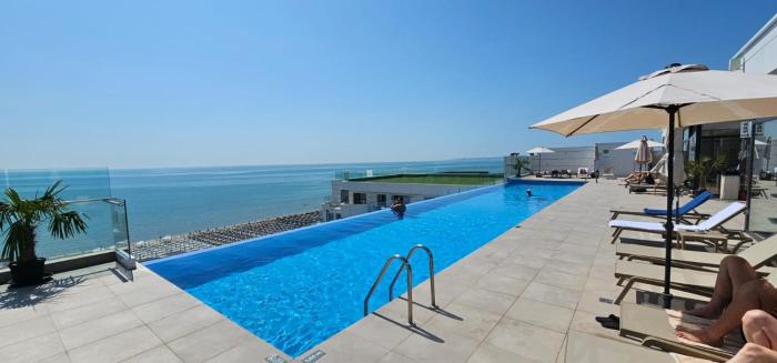 Infinity Roof Top Pool Beach & Spa Resort Apartments