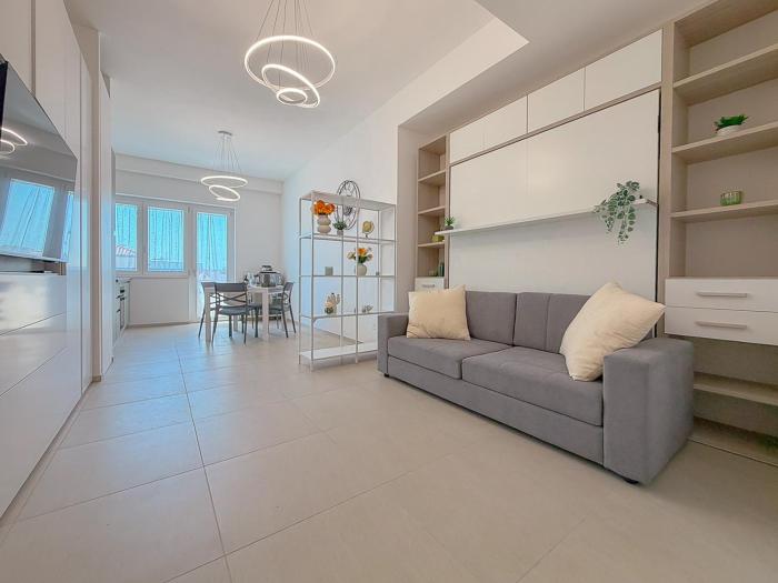 Bright Studio with AC and Balcony by Host Hero