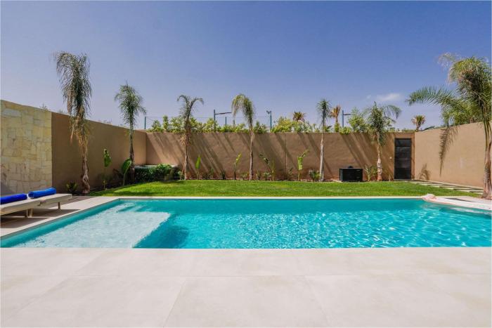 Bungalow Menara Piscine chauffee sans vis a vis