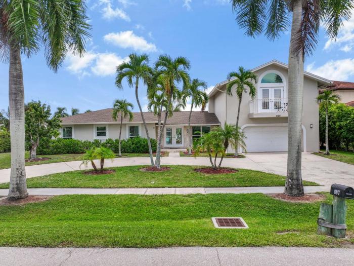 Pet-friendly two-story home with pool, spa, and grill