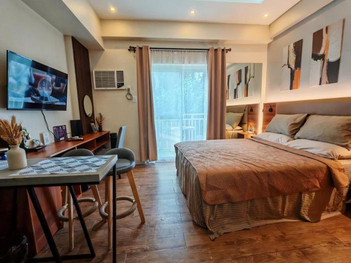 Condo Travelers Nest 211, Amani Resorts Residences, 5 minutes Airport, Netflix, Stylish, Cozy with Luxurious Swimming Pool