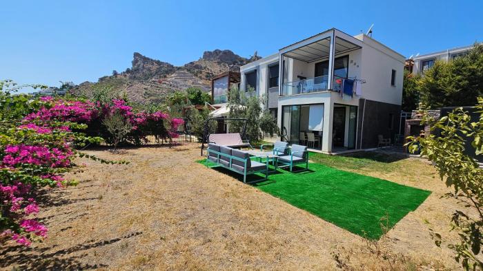 Bodrum Gündoğan Bahçeli Plaj Kullanımlı iyi eşyalı Begonvilli Yeni Ev