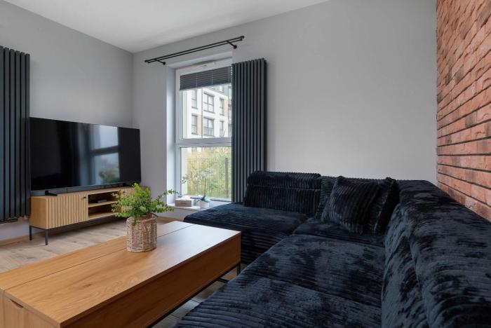 Przestronny Apartament z Ogrodem i Parkingiem by Noclegi Renters