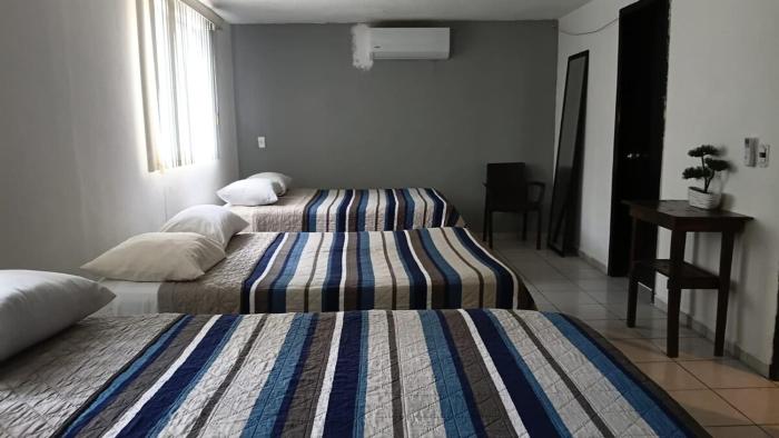 3 camas matrimnoniales, baño, Clima,Wifi, G Estacionamiento,Independiente