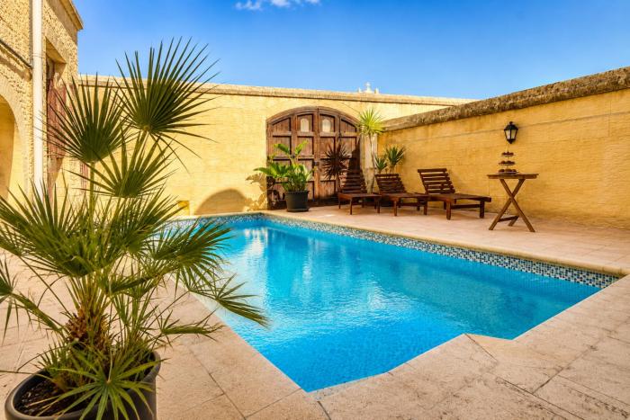 Two Connected Farmhouses in Gharb Gozo with 2 Private Pools Rooftops and BBQ Sleeps 16