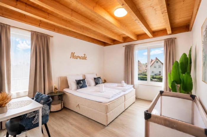 NAMASTÉ Homes - Ferienwohnung mit Balkon & Carport