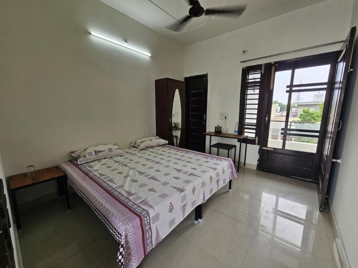 Private Room with Balcony & Rooftop Access