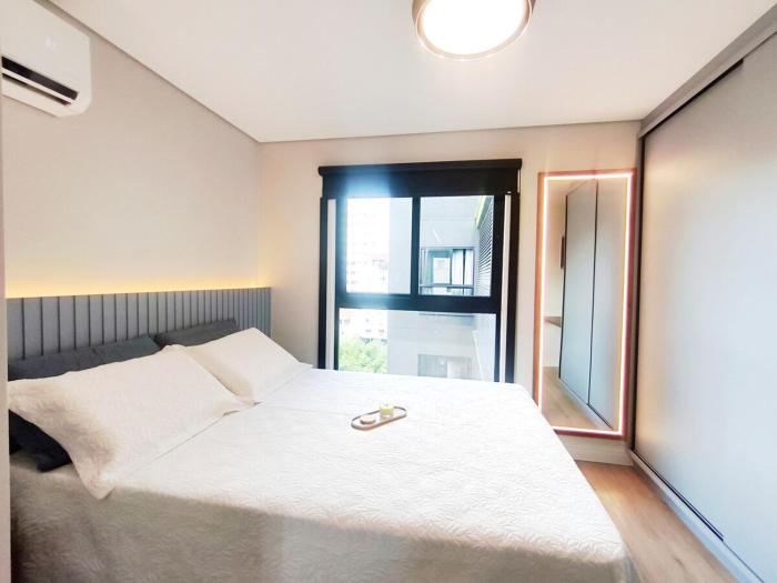Loft com garagem, piscina e coworking no centro606