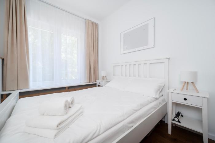 Manufaktura Cosy Apartment by BookingHost