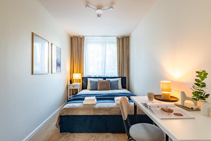 Reymonta Three-Bedroom Apartment near Metro by Mia