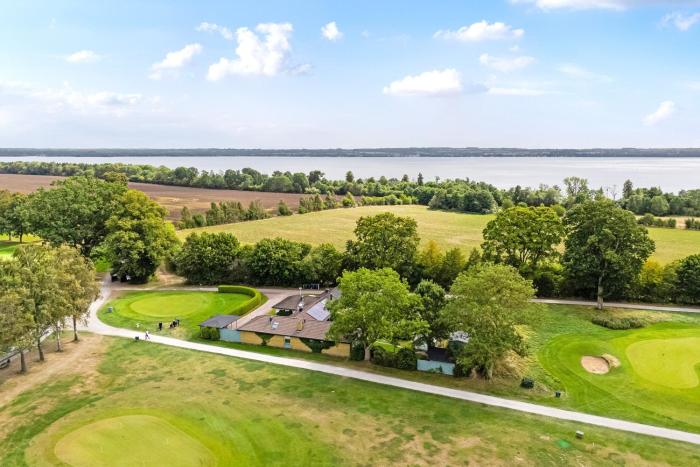 Countryside house near lake, golf course & castle